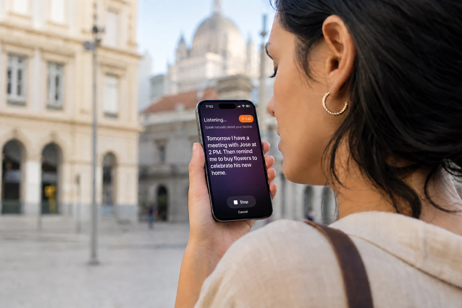 A woman saying her plans to Plana while walking through downtown Rio